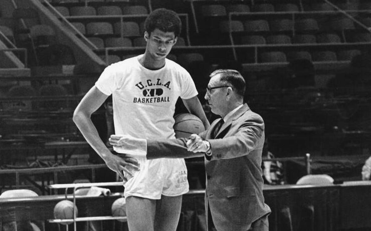 Lew Alcindor, now known as Kareem Abdul-Jabbar, talked with coach John Wooden during their days at UCLA.
