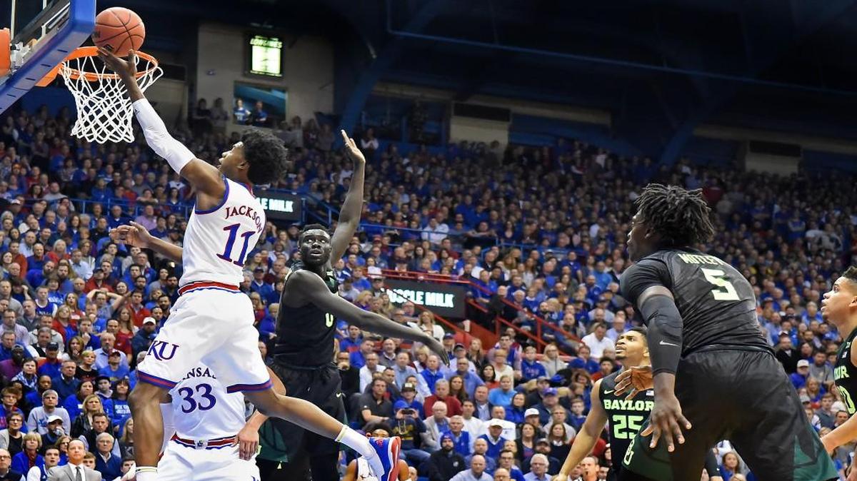 KU's Josh Jackson beats Baylor's Jo Lual-Acuil for a bucket during the first half on Wednesday, Feb. 1, 2017.