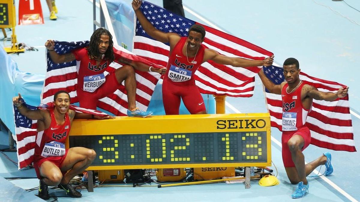 Kyle Clemons (right) was part of the 1,600-meter relay team that set a world record at the Athletics World Indoor Championships in Poland in 2014. The other members were, from left, Kind Butler, David Verburg and Calvin Smith.