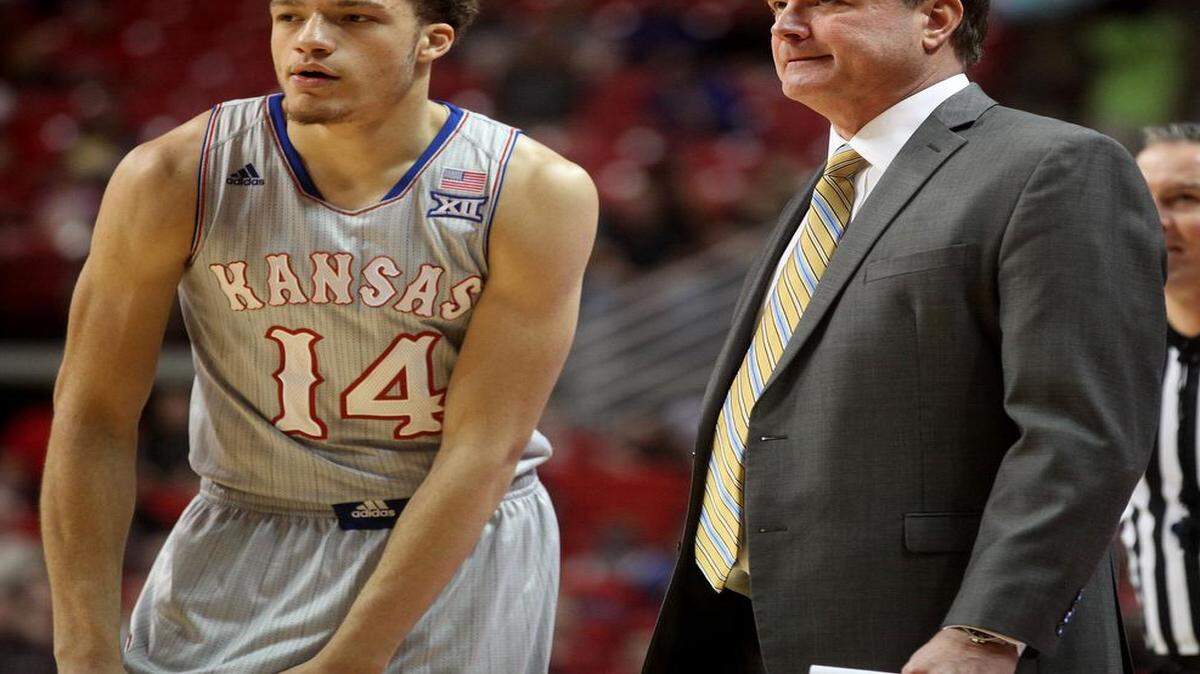 
Kansas coach Bill Self talks with Brannen Greene during Feburary’s game at Texas Tech.
