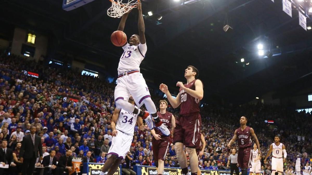 Kansas forward Cheick Diallo dunks over Montana forward Fabijan Krslovic last December.