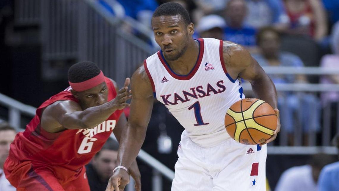 
Team Canada forward Mamadou Gueye (left) fouled Kansas guard Wayne Selden during an exhibition game game at the Sprint Center on June 26. 
