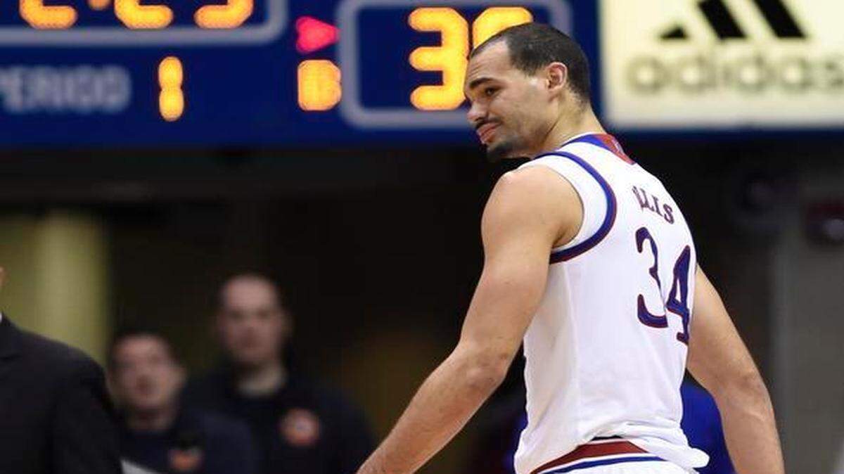 
KU's Perry Ellis walks off the court after being injured late in the first half of Tuesday night's game at Allen Fieldhouse.
