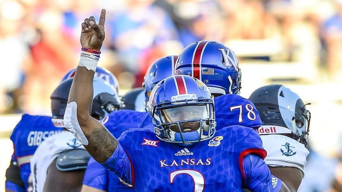 Kansas quarterback Montell Cozart looks to the sideline after a big gain in the first half Saturday in Lawrence.