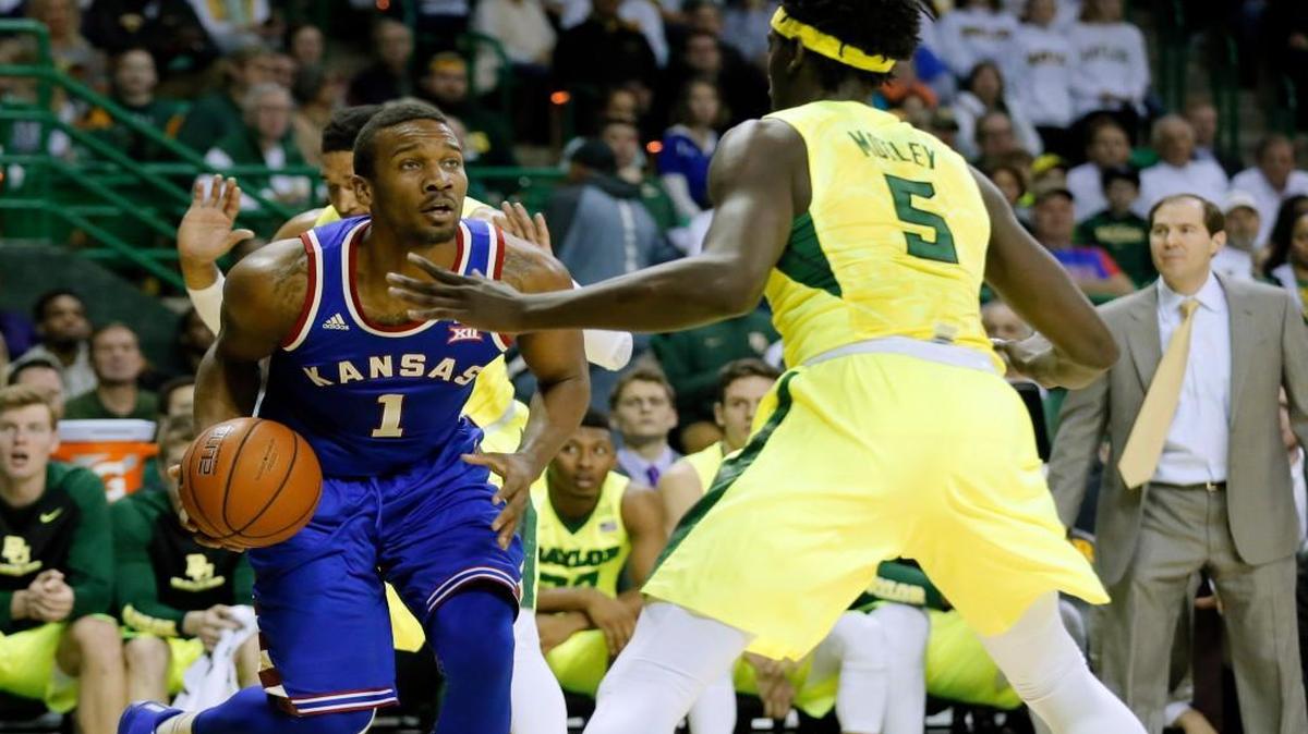 Kansas guard Wayne Selden Jr. attempts to drive the baseline against Baylor’s Johnathan Motley in the first half Tuesday in Waco, Texas.
