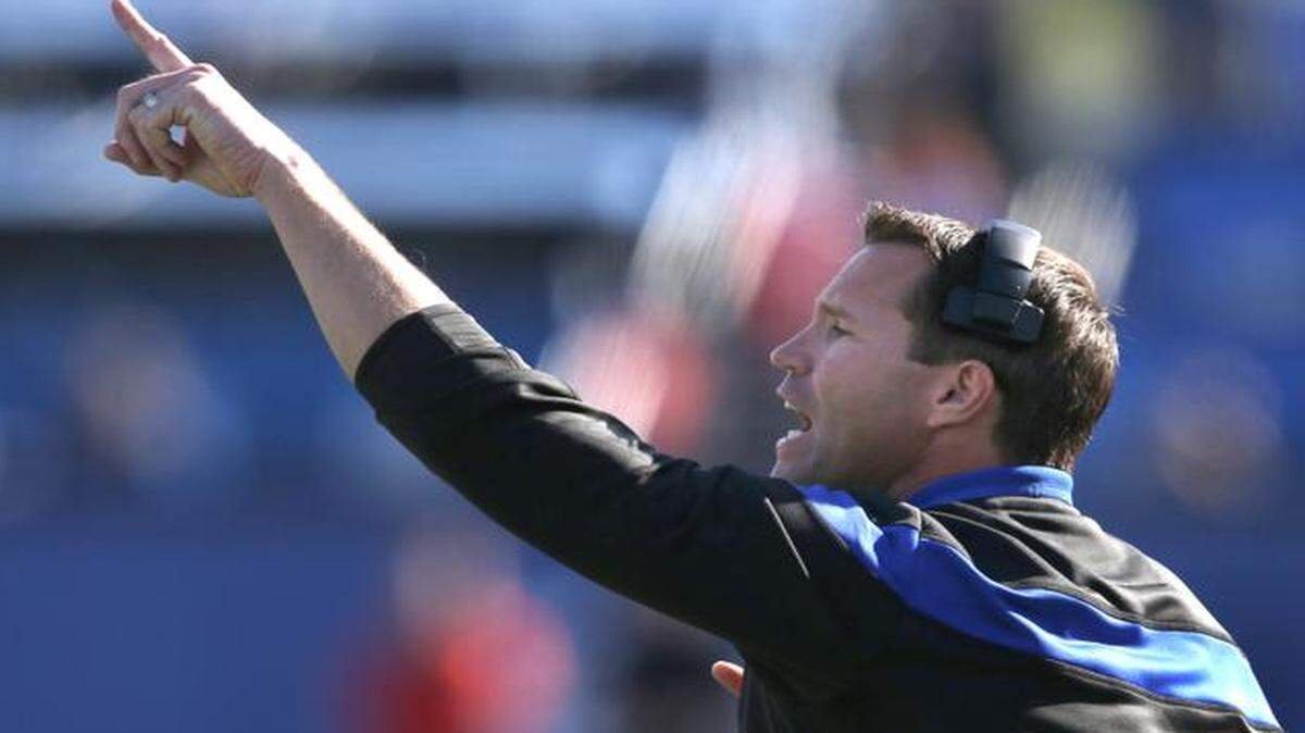 
Kansas coach Clint Bowen signals his team against Oklahoma State on Oct. 11.
