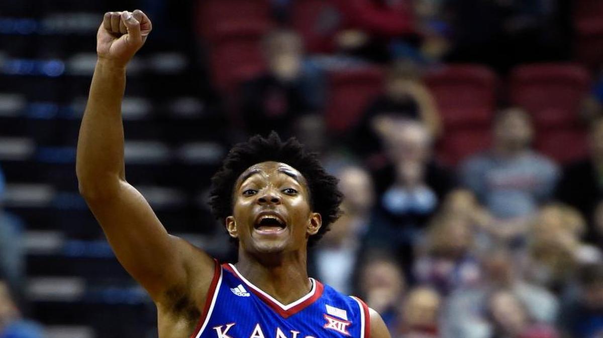 Kansas guard Devonte' Graham calls a plays as he brings the ball up against UNLV during the first half on Dec. 22.