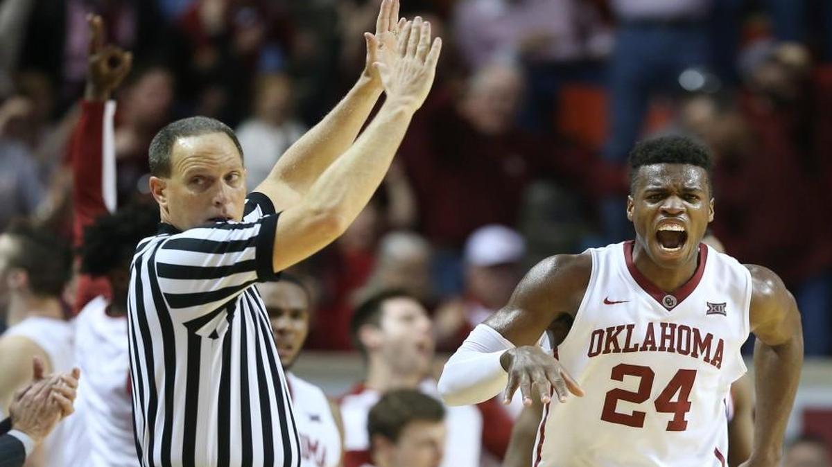 Oklahoma guard Buddy Hield celebrates a three-pointer during the second half against Kansas on Feb. 13.