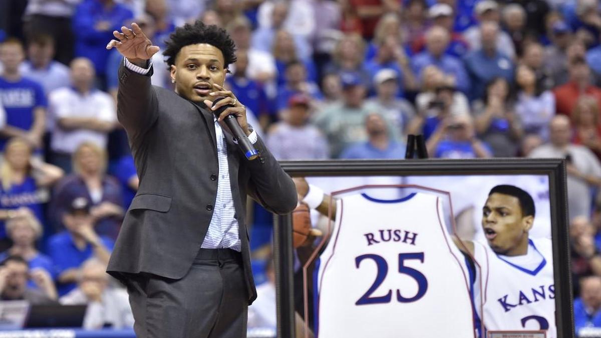 Former KU great Brandon Rush, who was a member of the 2008 NCAA championship team, talks during a halftime ceremony Wednesday night at Allen Fieldhouse.