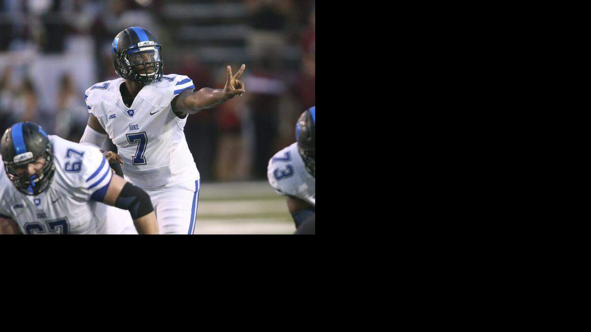 
Duke quarterback Anthony Boone (7) signals during Saturday’s victory over Troy.
