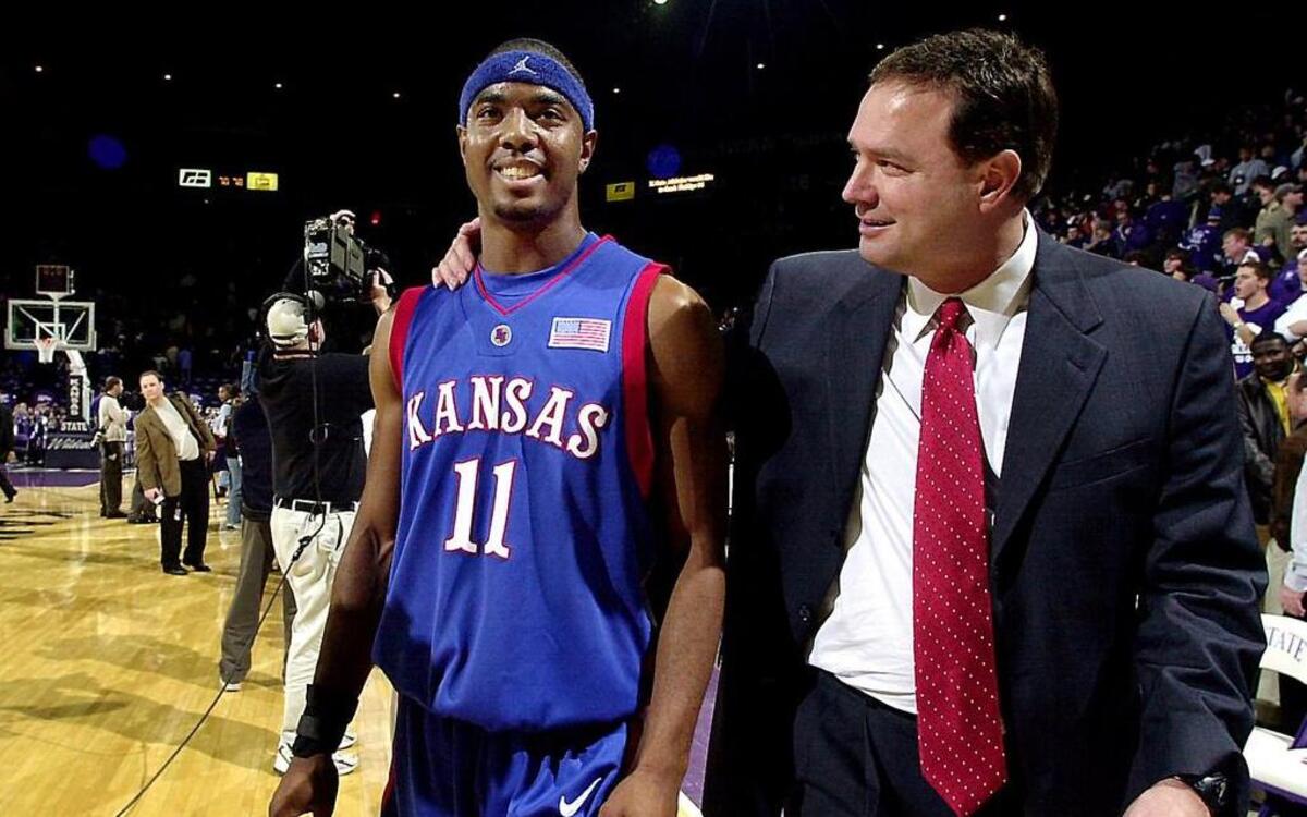 
Former KU point guard Aaron Miles (left) and coach Bill Self will be reunited on the Jayhawks’ basketball staff this season. 
