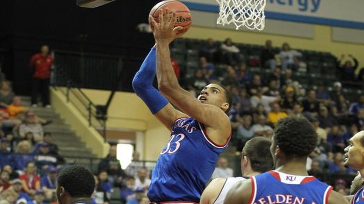 
Kansas forward Landen Lucas shoots during the first half of Thursday’s game in Lake Buena Vista, Fla.
