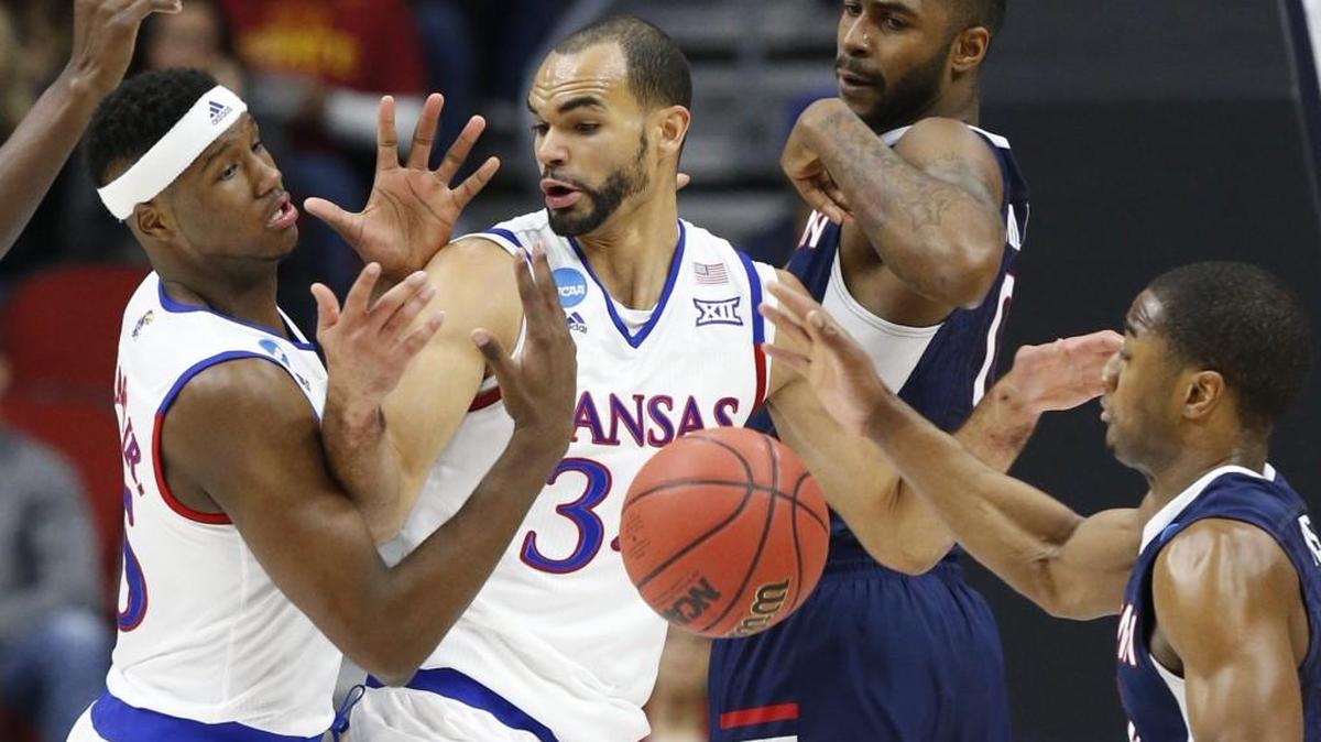 Kansas forward Perry Ellis fights for a rebound against Connecticut on Saturday in Des Moines.