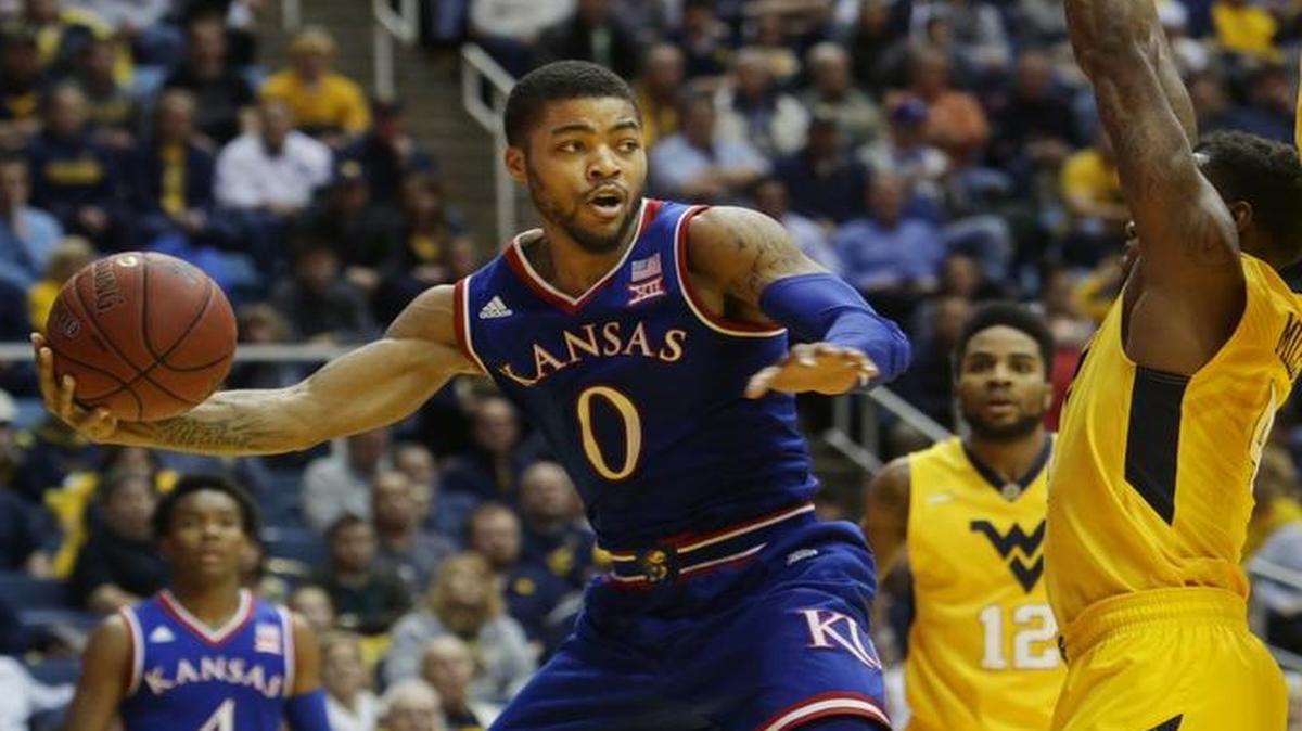 Kansas guard Frank Mason looks to pass during Tuesday’s game in Morgantown, W.Va.