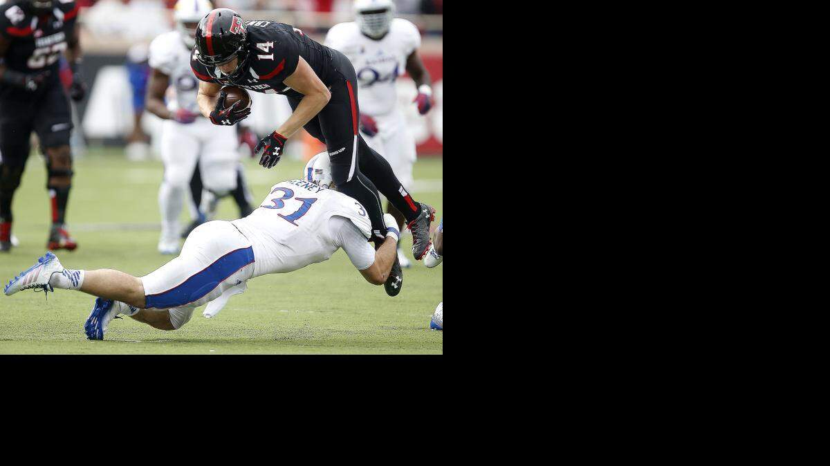 
Hutchinson’s Ben Heeney, a Kansas senior, makes a tackle in the Texas Tech game.
