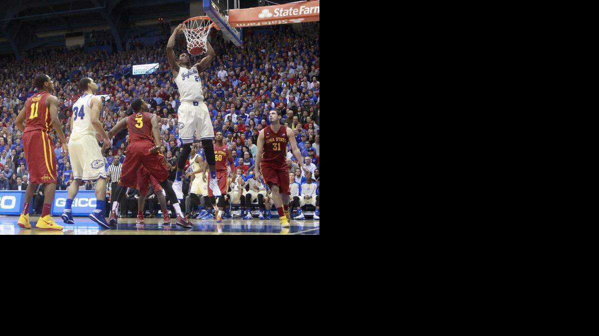 
Kansas' Joel Embiid dunks against Iowa State during the second half at Allen Fieldhouse last January.
