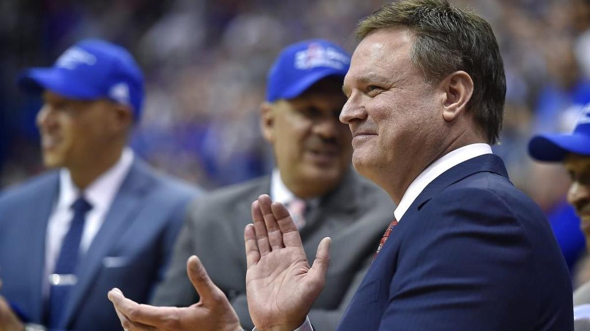 After his Jayhawks clinched at least a share of their 12th consecutive Big 12 Conference title Saturday, Kansas coach Bill Self and his staff watched the players cut down the nets after they defeated Texas Tech 67-58 at Allen Fieldhouse.