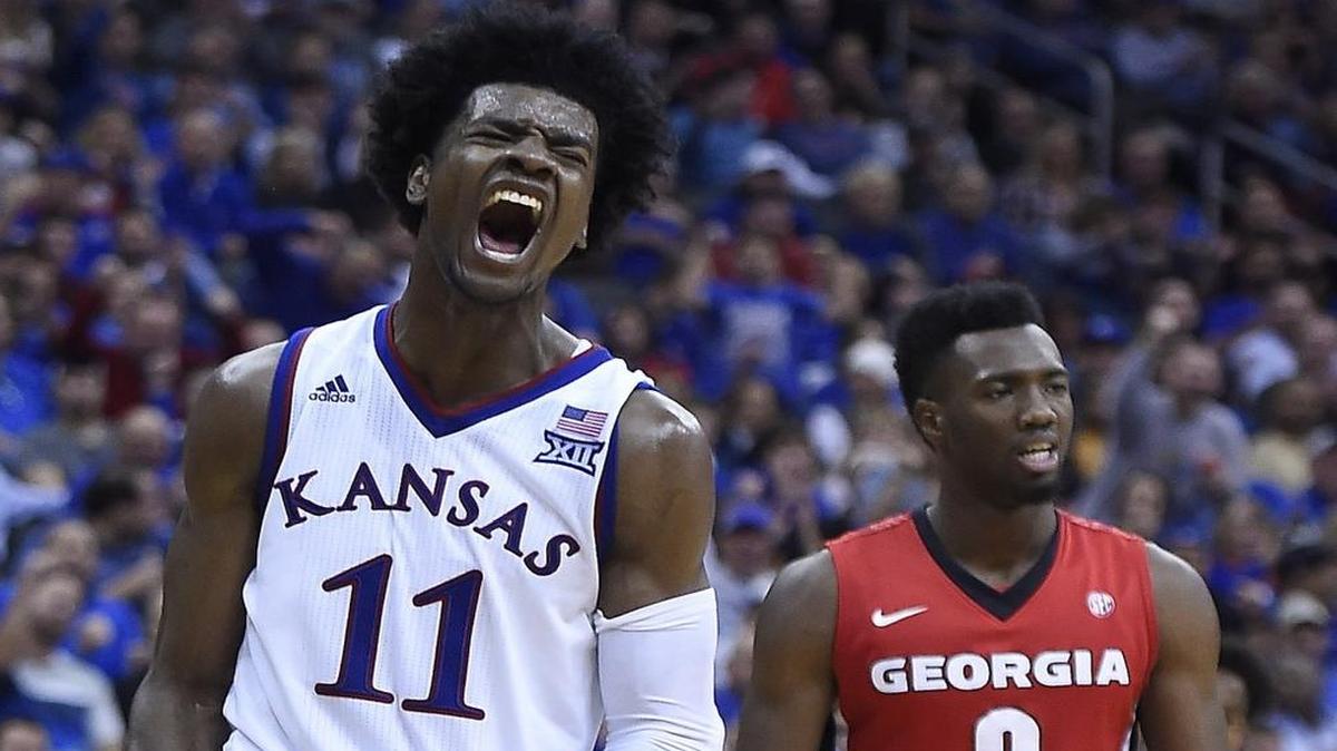 Josh Jackson is excited after driving by Georgia defenders for a basket during the second half of Tuesday night’s CBE Classic championship game.