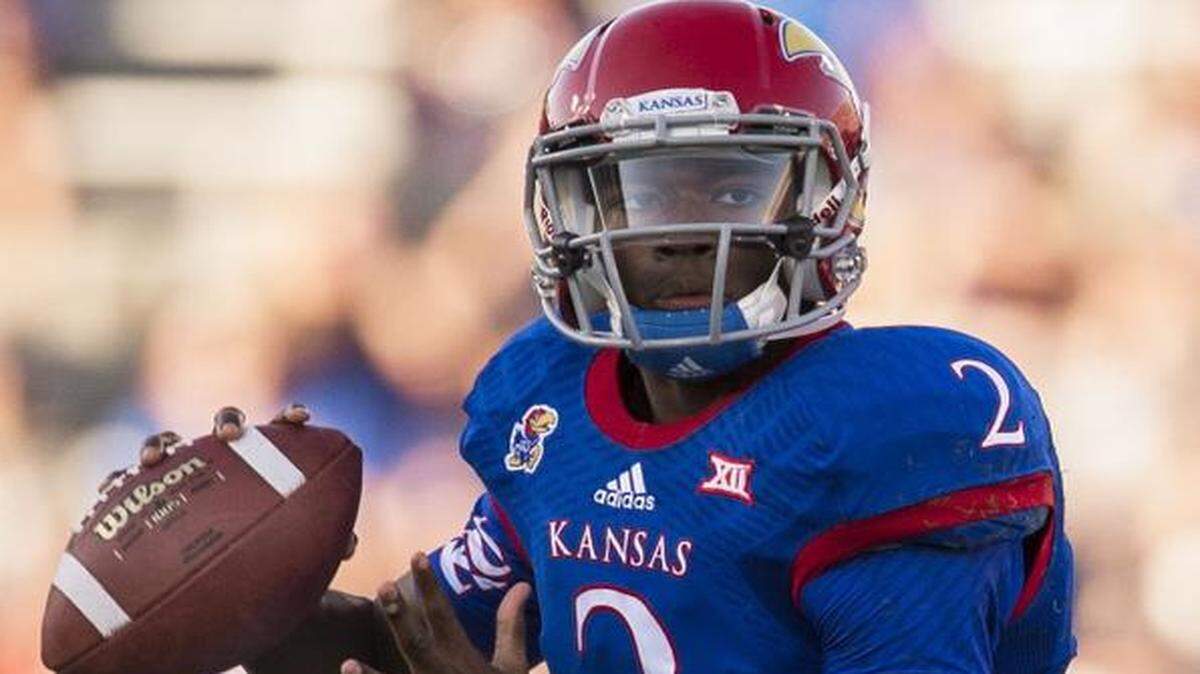 
Kansas quarterback Montell Cozart ) prepares to throw a pass in the first quarter of the season-opener against Southeast Missouri State.
