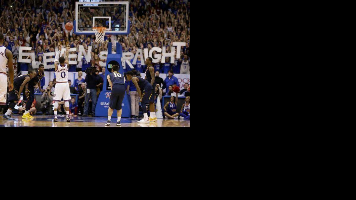 
Kansas guard Frank Mason shoots a free throw during overtime Tuesday night against West Virginia in Lawrence.
