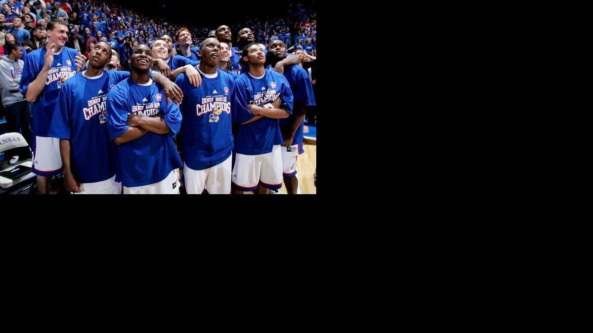 
The 2006-07 Jayhawks were all smiles while watching a video tribute to their championship season after a win over Texas on March 3, 2007, at Allen Fieldhouse.
