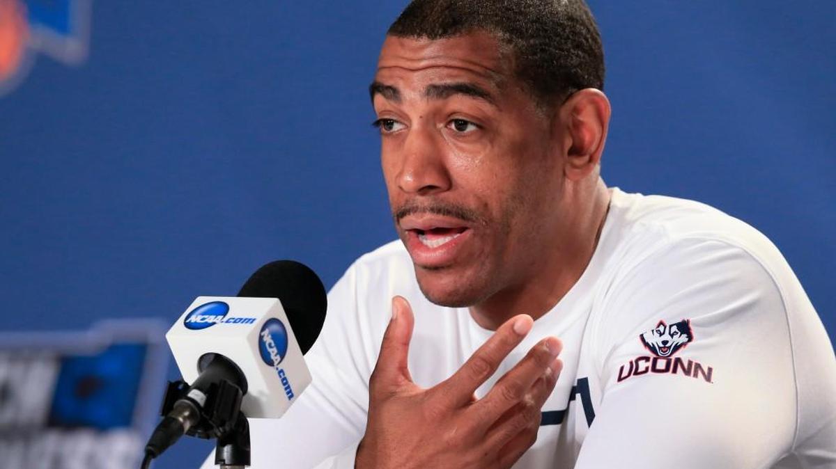 Connecticut coach Kevin Ollie speaks during a news conference Friday in Des Moines.