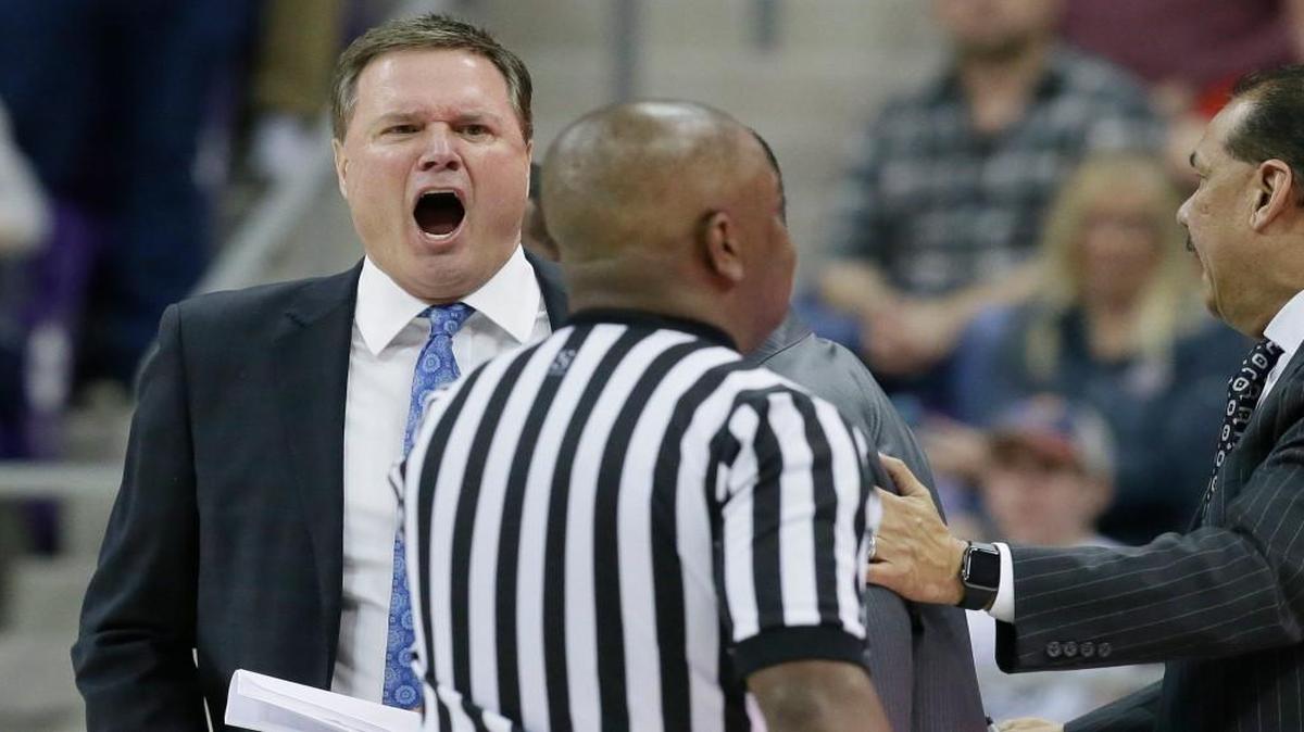 Kansas coach Bill Self, left, reacts to a call during Friday’s game at Texas Tech. Foul trouble to freshman Josh Jackson caused Self to use more bench minutes, though only seven players saw the floor.