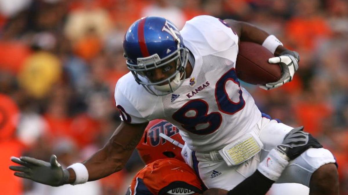 Kansas receiver Dezmon Briscoe tried to elude a tackle by UTEP defender Da’Mon Cromartie Smith during a game on Sept. 12, 2009, in El Paso, Texas. It was KU football’s last road win.