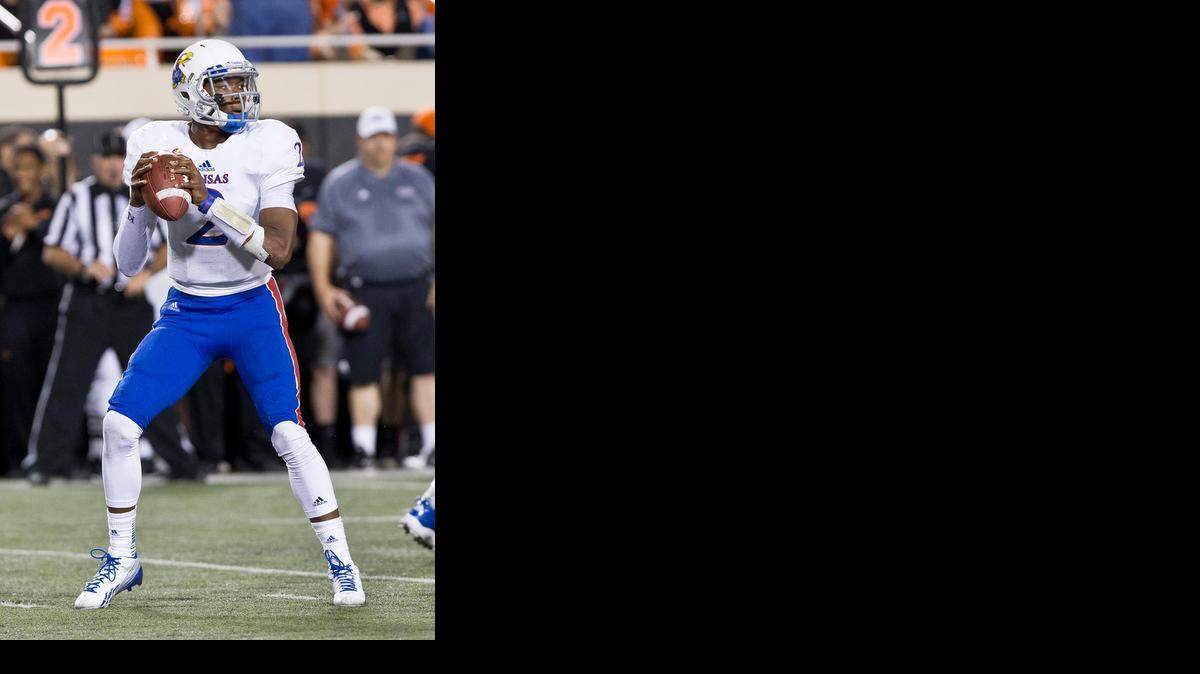 
Kansas quarterback Montell Cozart (2) looks to pass against Oklahoma State last season.
