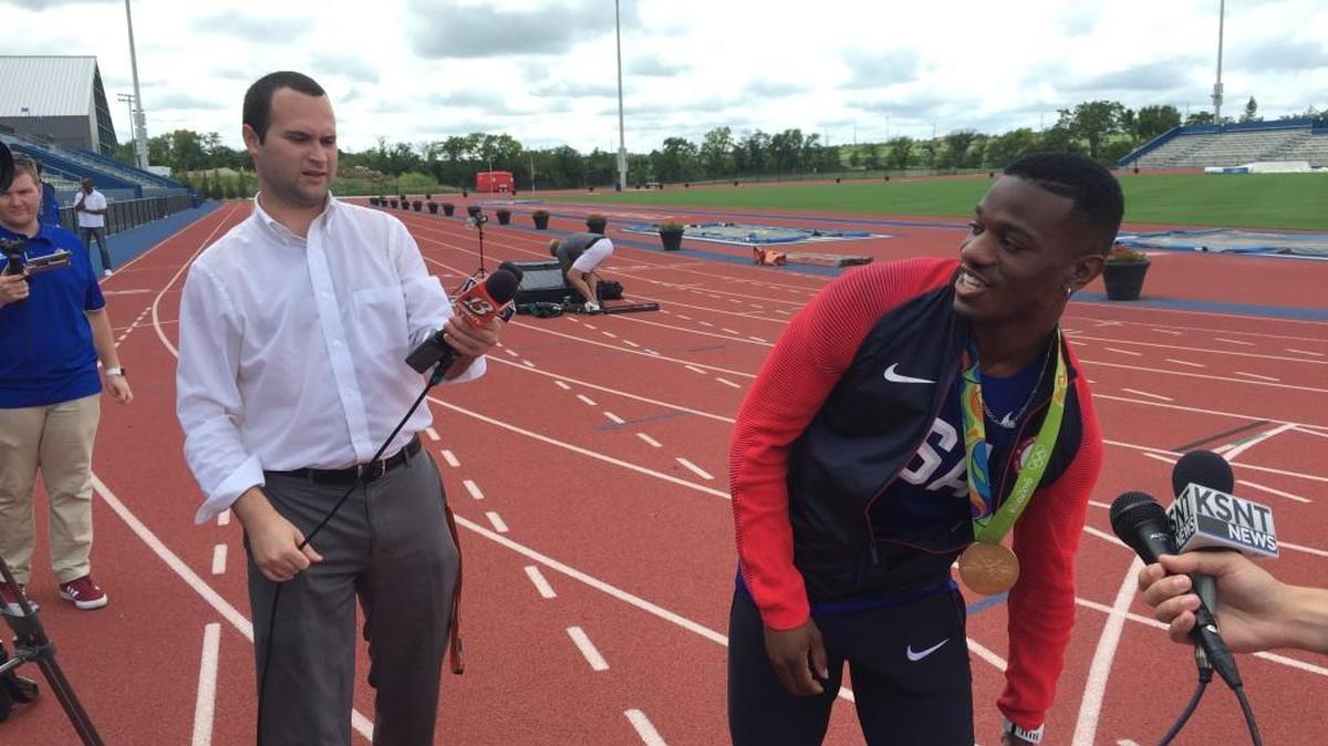 Former Kansas sprinter Kyle Clemons talks with reporters at Rock Chalk Park about his goal-medal winning trip to the Rio Olympics.