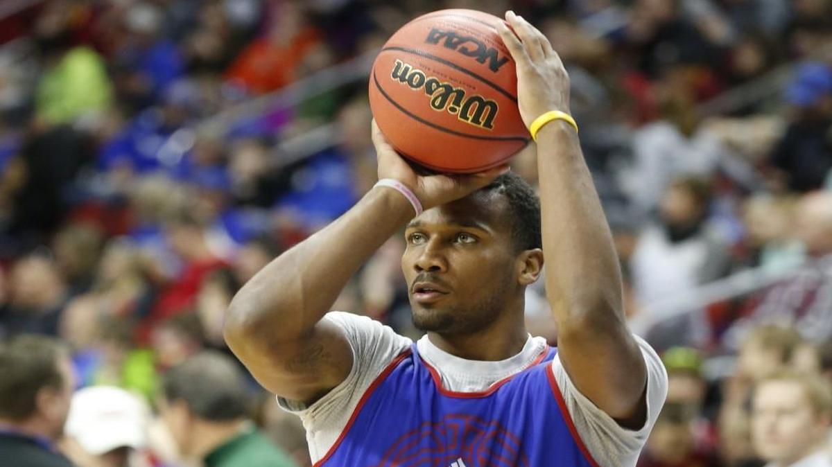 Kansas guard Wayne Selden takes a shot during KU’s workout in the Wells Fargo Arena. (March 16, 2016)
