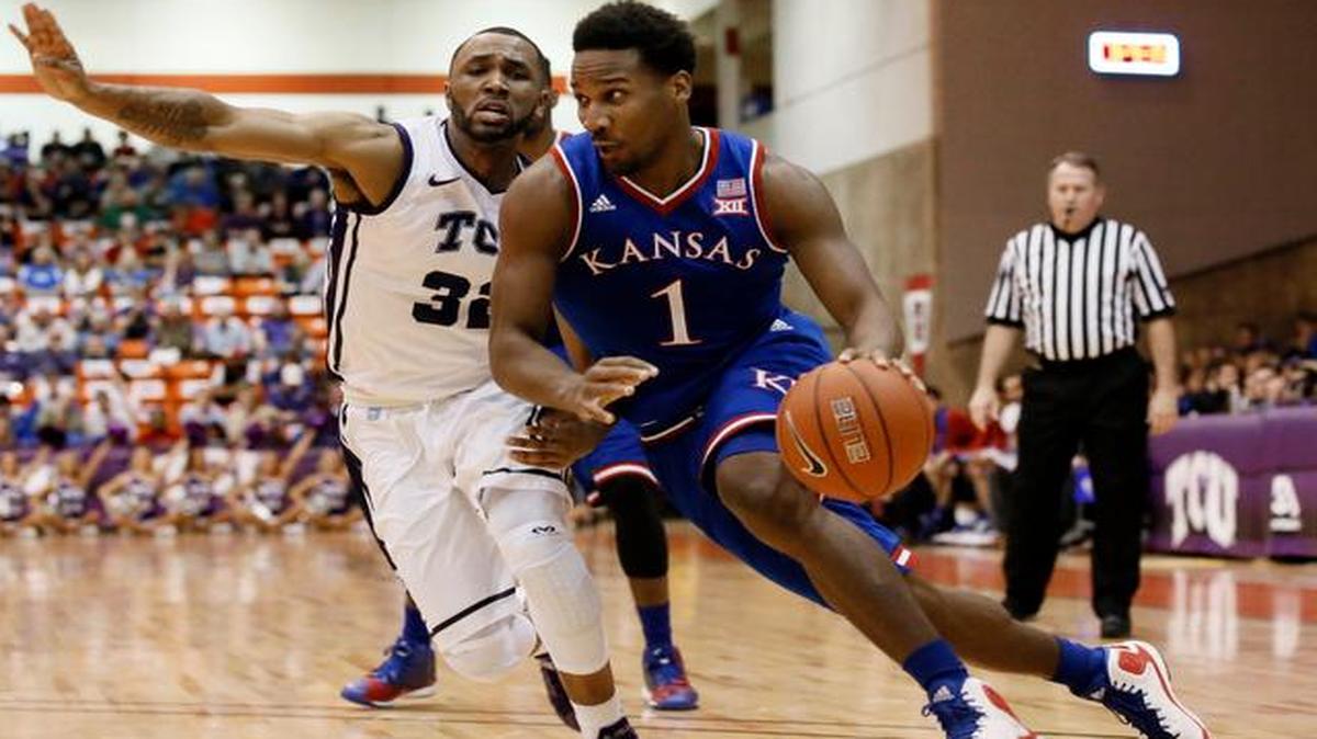 
Kansas guard Wayne Selden Jrdrives to the basket past TCU guard Trey Zeigler during the first half Wednesday in Fort Worth.
