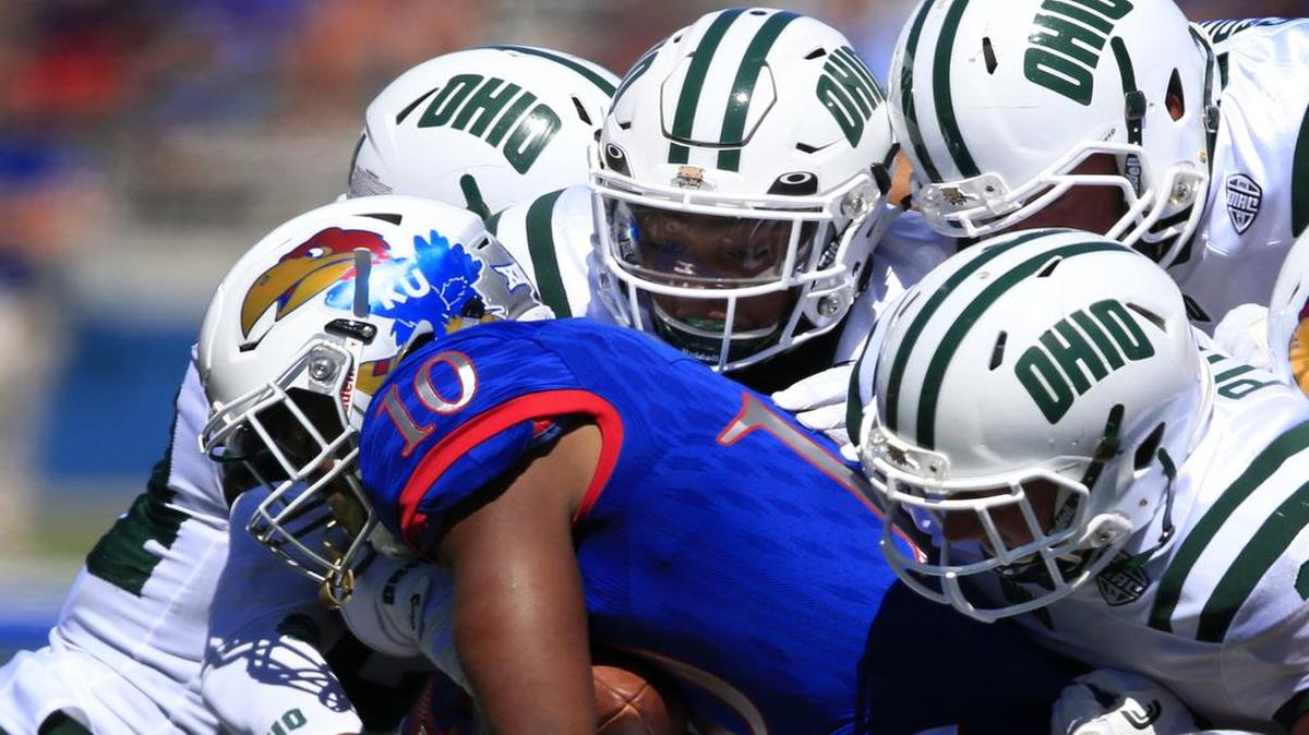 Kansas running back Khalil Herbert was stopped by a swarm of Ohio defenders in a Sept. 10 loss.