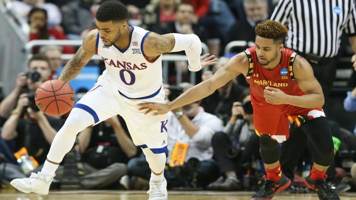 Maryland guard Melo Trimble fouls Kansas guard Frank Mason after Mason stole the ball from him during the second half in Louisville on Thursday night.