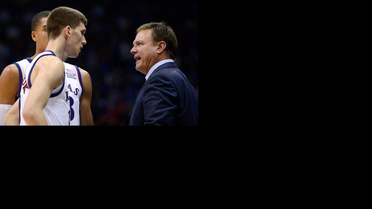 
KU freshman Sviatoslav Mykhailiuk (left) and Kansas coach Bill Self chat during the second half of last Monday's exhibition game at Allen Fieldhouse.
