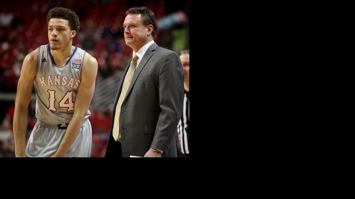 
Kansas head coach Bill Self talks with Brannen Greene during their game against Texas Tech on Tuesday in Lubbock, Texas. 
