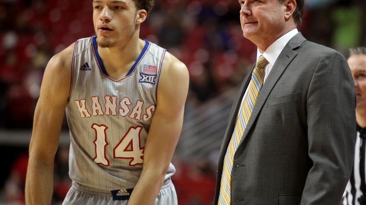 Kansas’ Brannen Greene, left, and coach Bill Self.