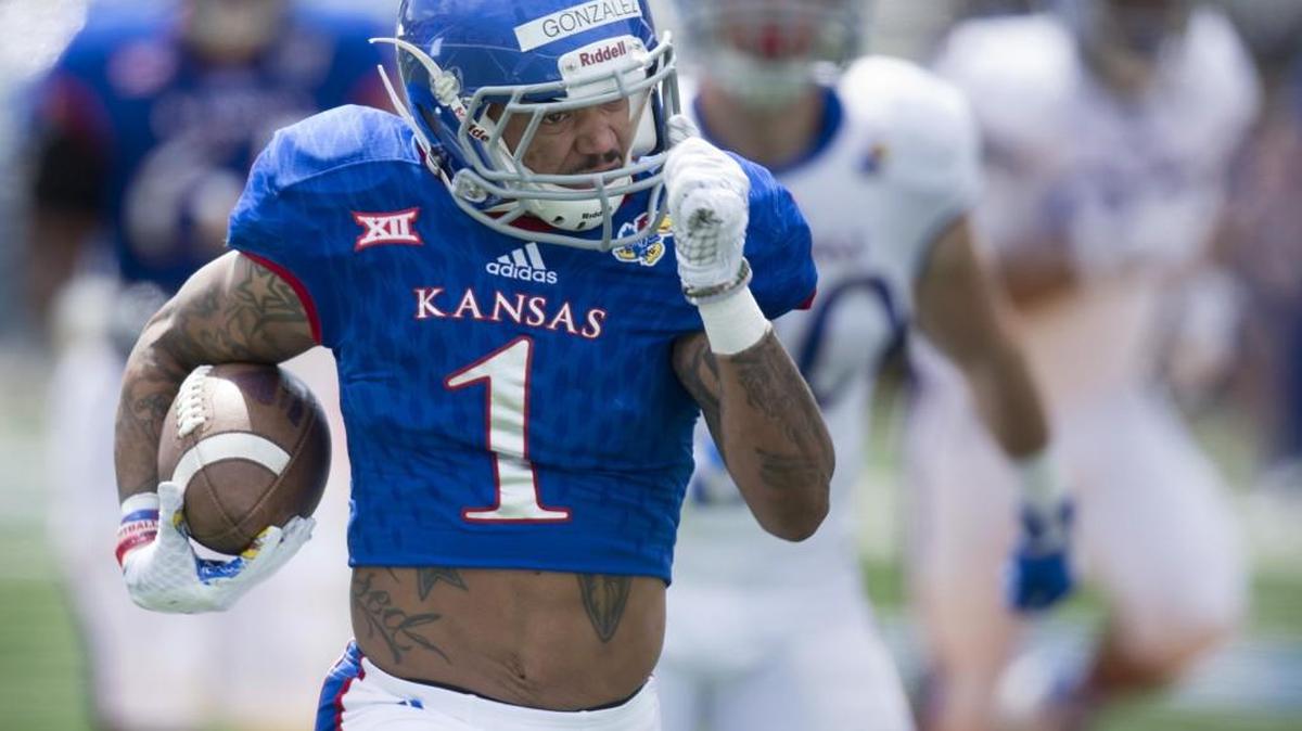 Kansas wide receiver LaQuvionte Gonzalez catches a touchdown pass during the spring game last April.