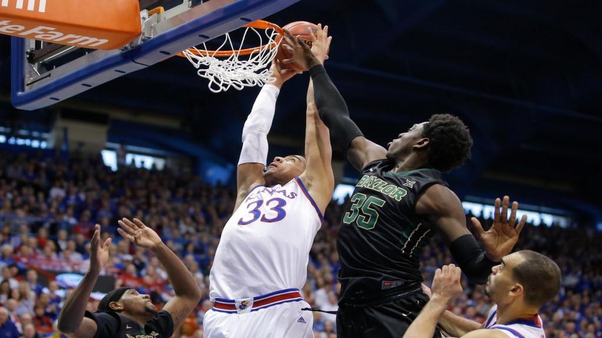 Kansas’ Landen Lucas and Baylor’s Johnathan Motley buttle during last season’s game at Allen Fieldhouse.