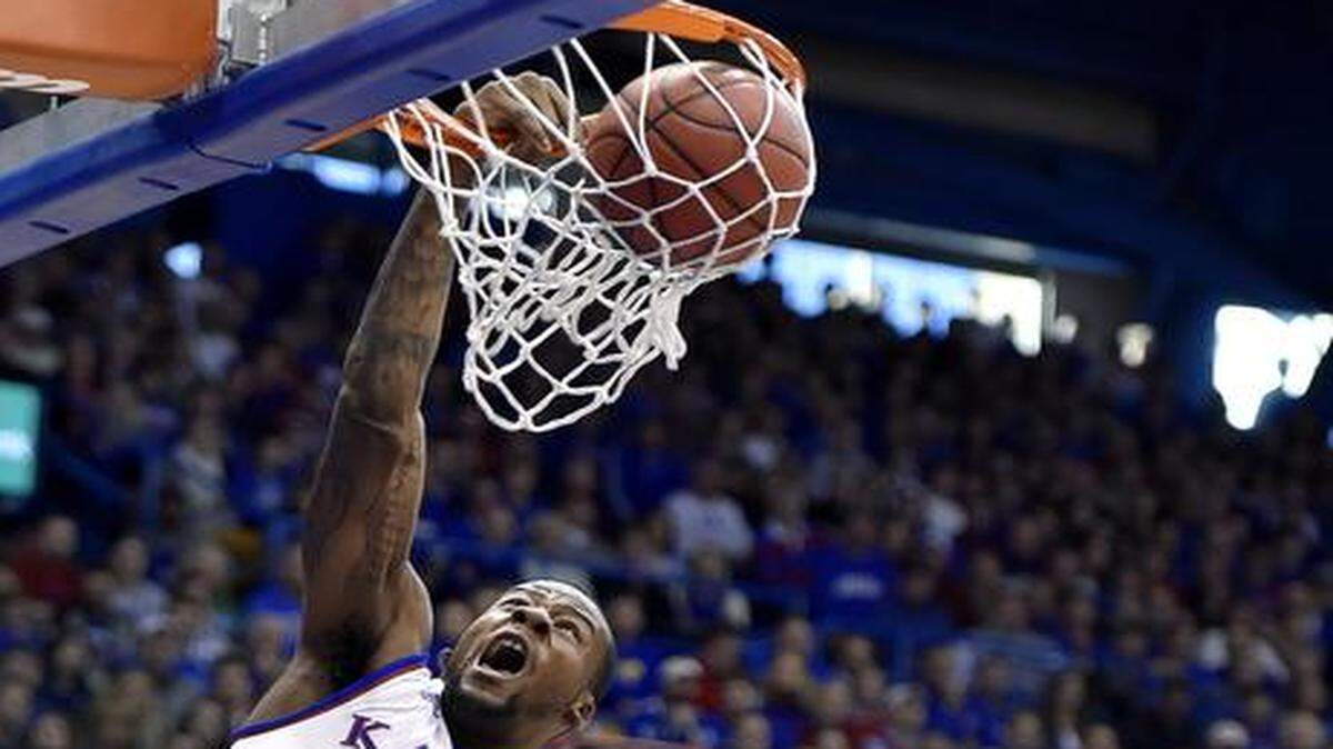 
Kansas’ Cliff Alexander gets loose for a dunk over UNLV's Goodluck Okonoboh Sunday in Lawrence.
