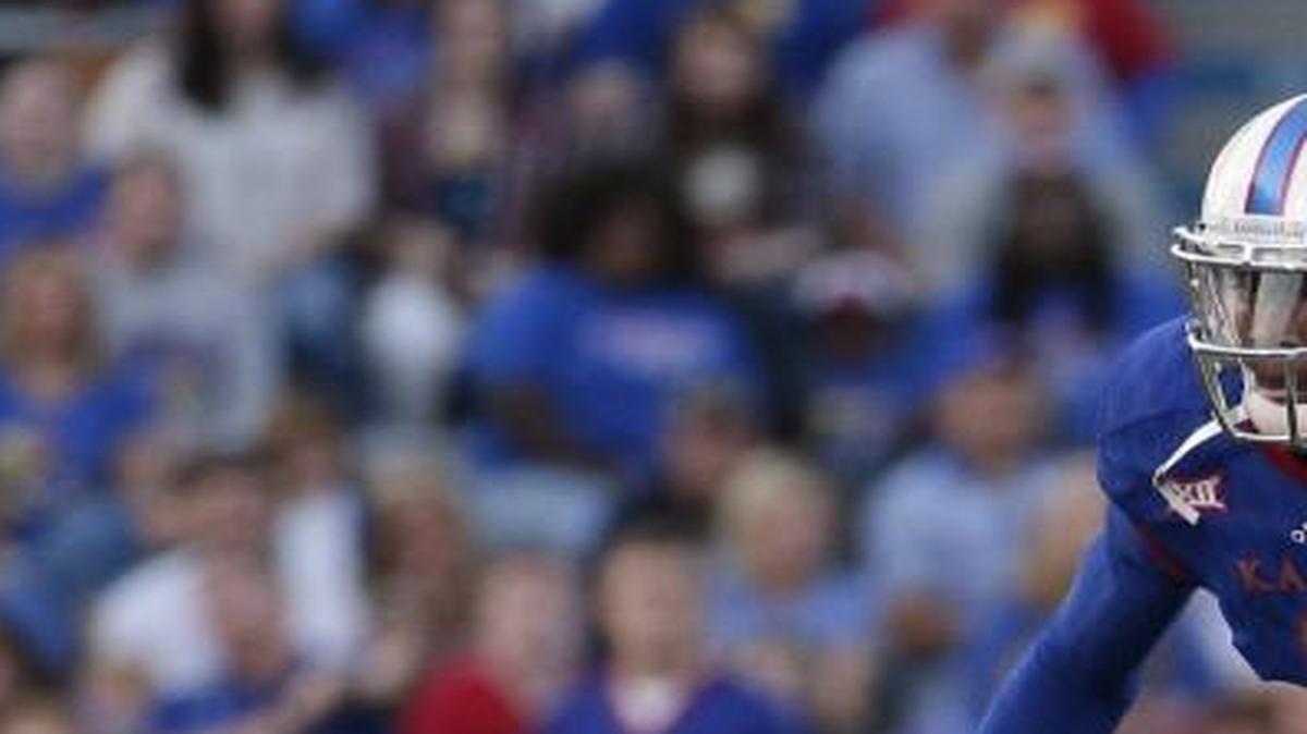 Kansas quarterback Montell Cozart (2) runs against Memphis in September.