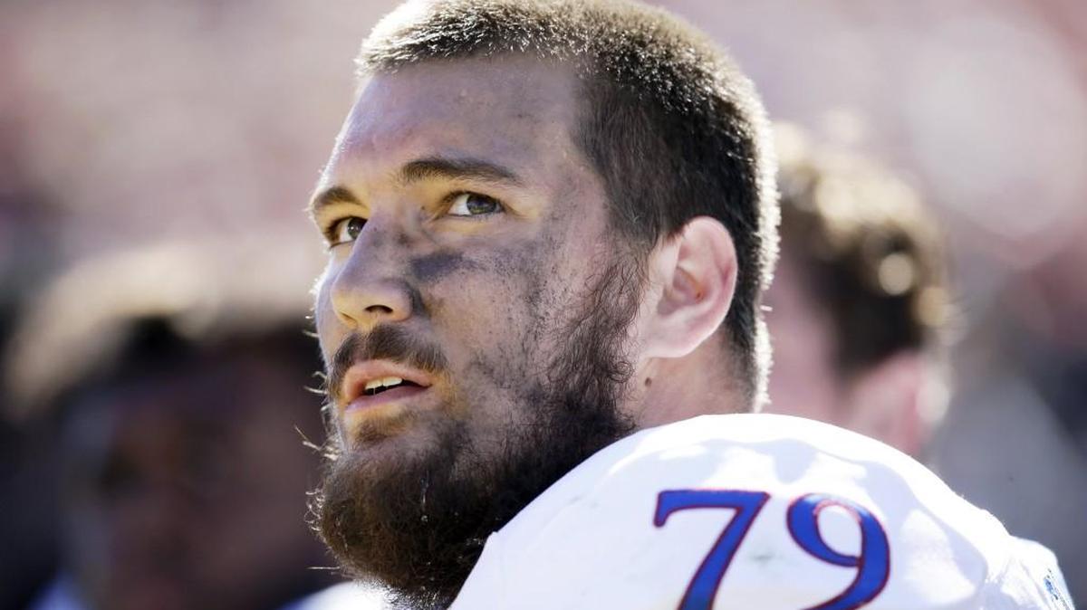 Kansas offensive lineman Jordan Shelley-Smith on the bench during the Iowa State game last season.