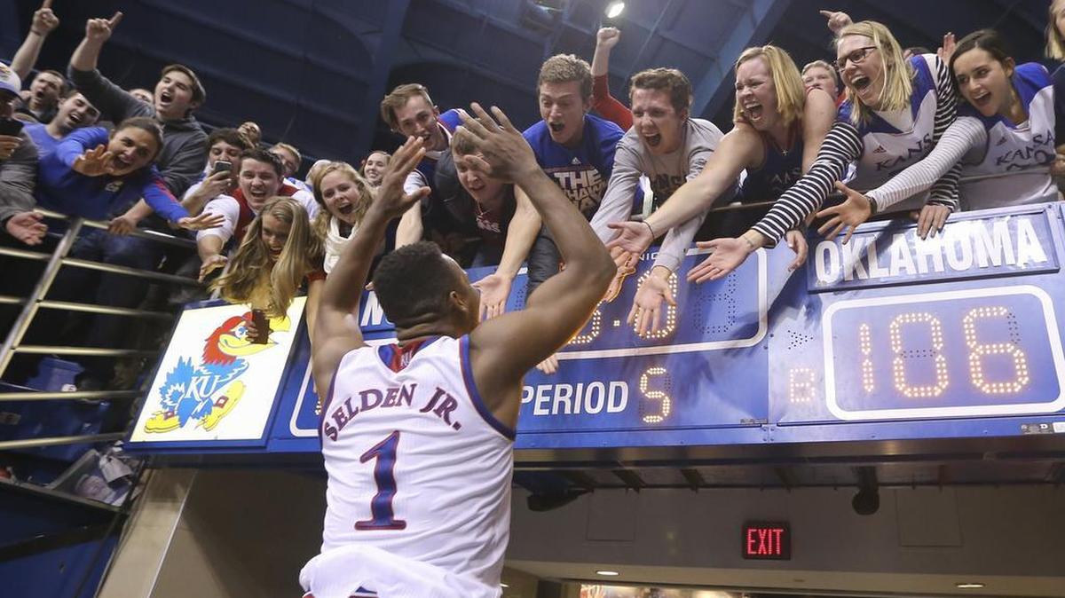 Wayne Selden Jr. celebrates win fans after the Jayhawks beat Oklahoma 109-106 in triple overtime at Allen Fieldhouse on Monday night.