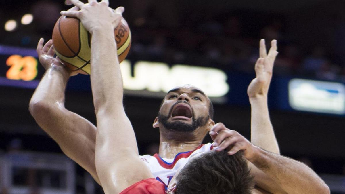 
Perry Ellis is fouled by Canada’s Mikeal Andrews during Kansas’ exhibition game Friday at Sprint Center in Kansas City, Mo. 
