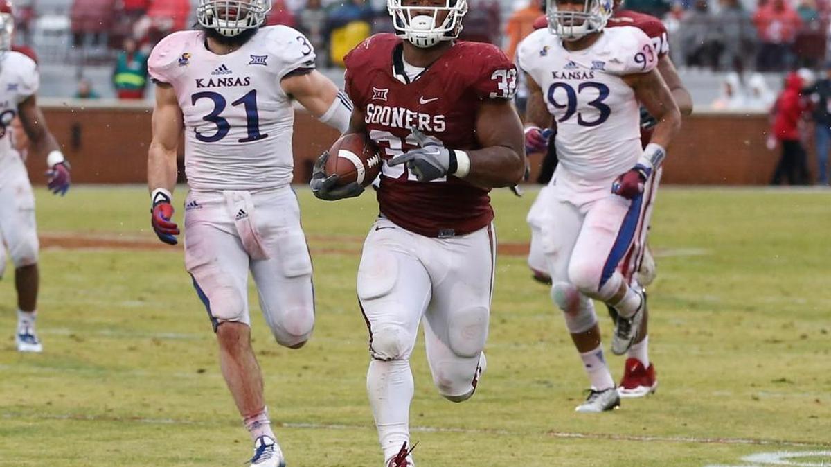 Oklahoma's Samaje Perine (32) had an NCAA-record 427 rushing yards against Kansas in Norman last season.