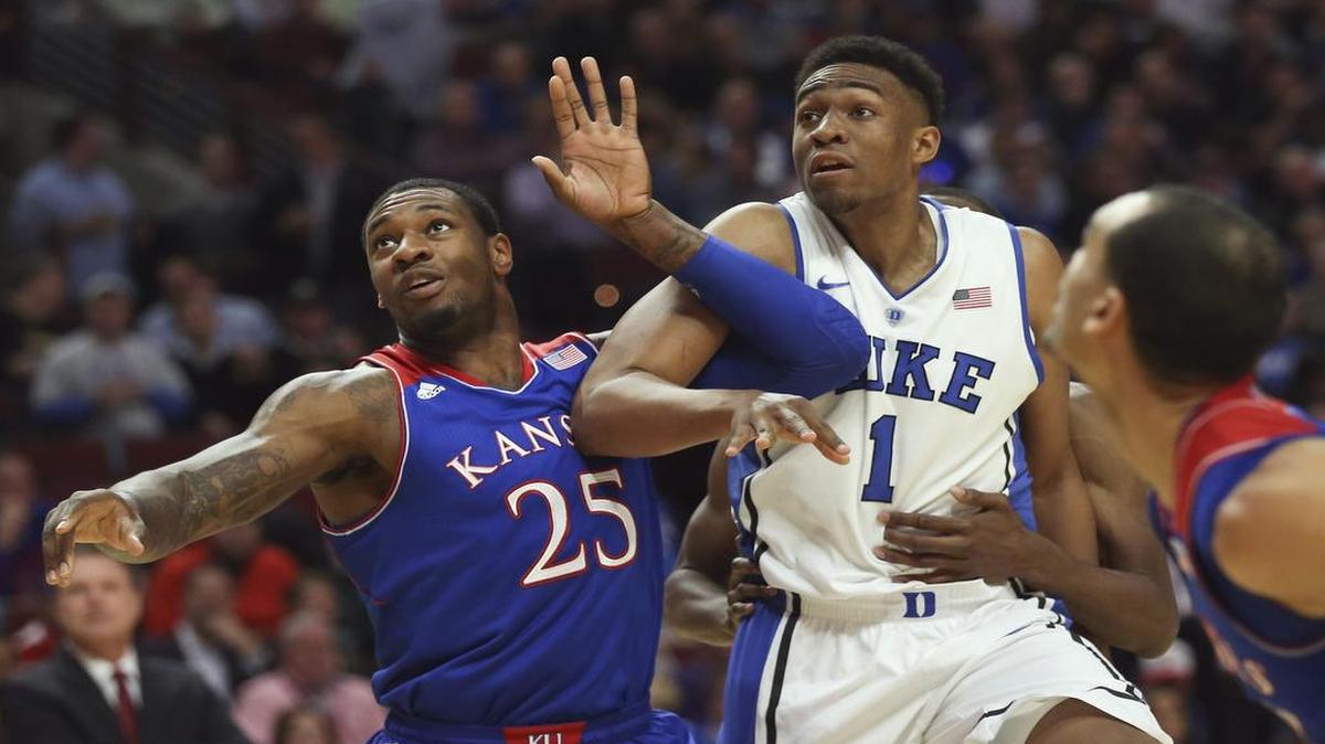 Kansas and Tarik Black (left) beat Jabari Parker and Duke in the 2013 Champions Classic in Chicago.