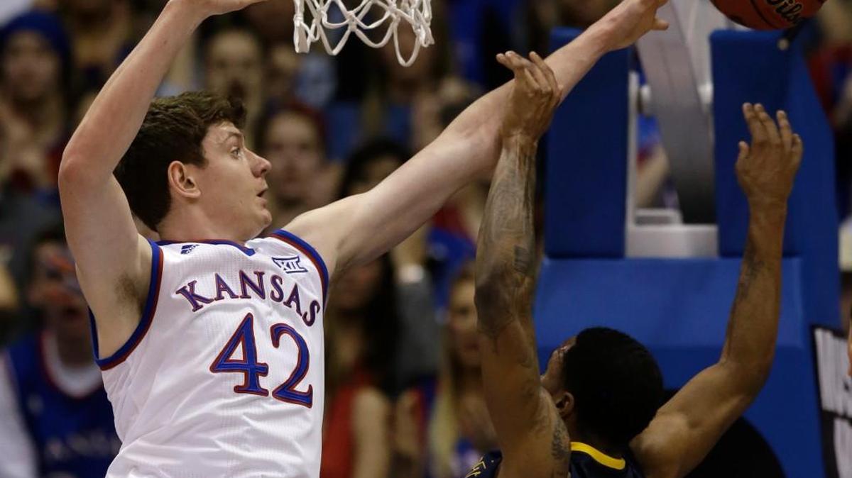 Kansas senior Hunter Mickelson (42) could be a victim of numbers in the frontcourt heading into his senior season. He’s one of six frontcourt players with arguments for playing time. This fall, KU coach Bill Self has called Mickelson one of the team’s most improved players.