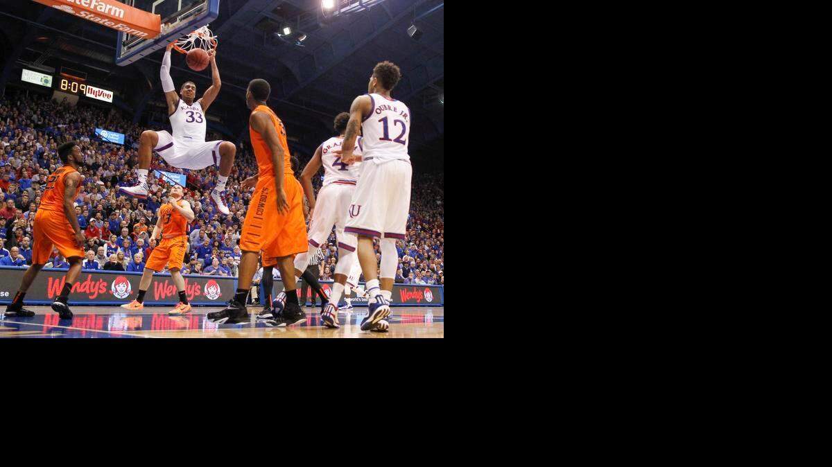 
Kansas forward Landen Lucas, dunking against Oklahoma State, spent his sixth-grade year in Japan with his mother.

