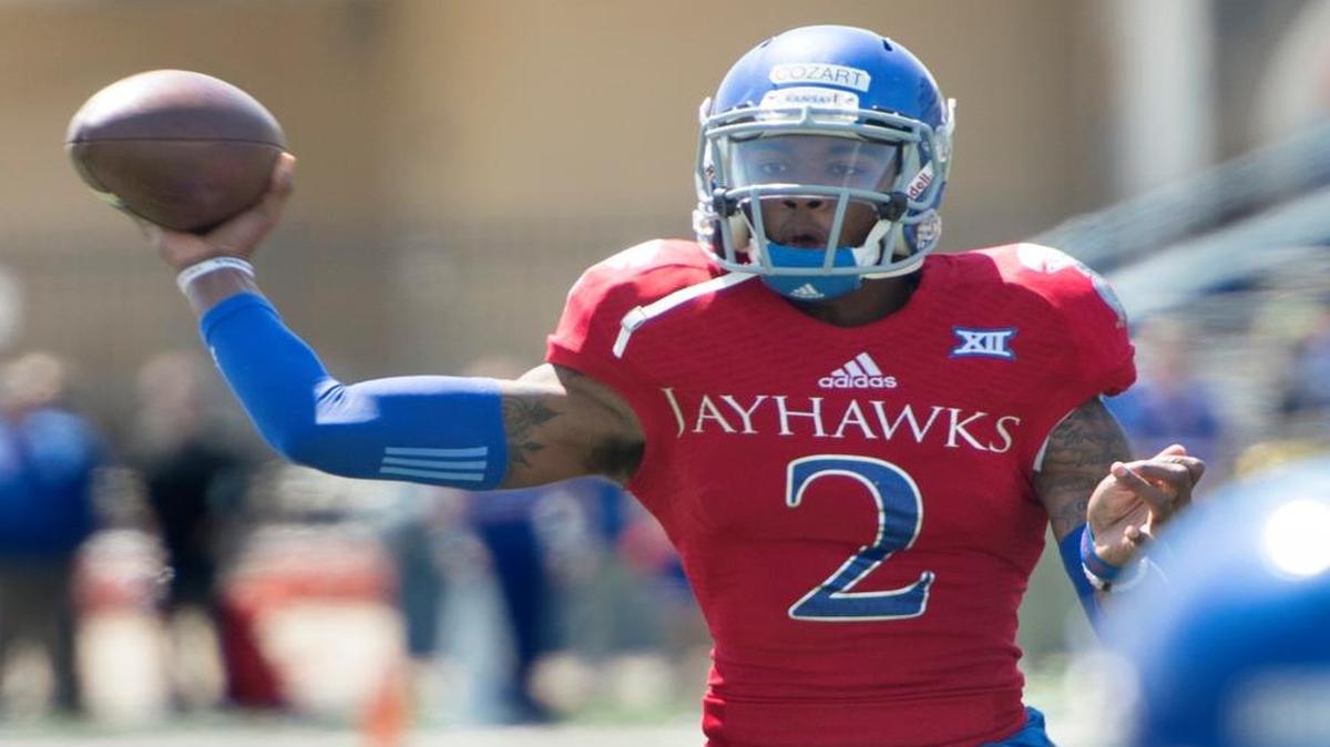 Montell Cozart throws a pass during the Kansas spring game Saturday in Lawrence.
