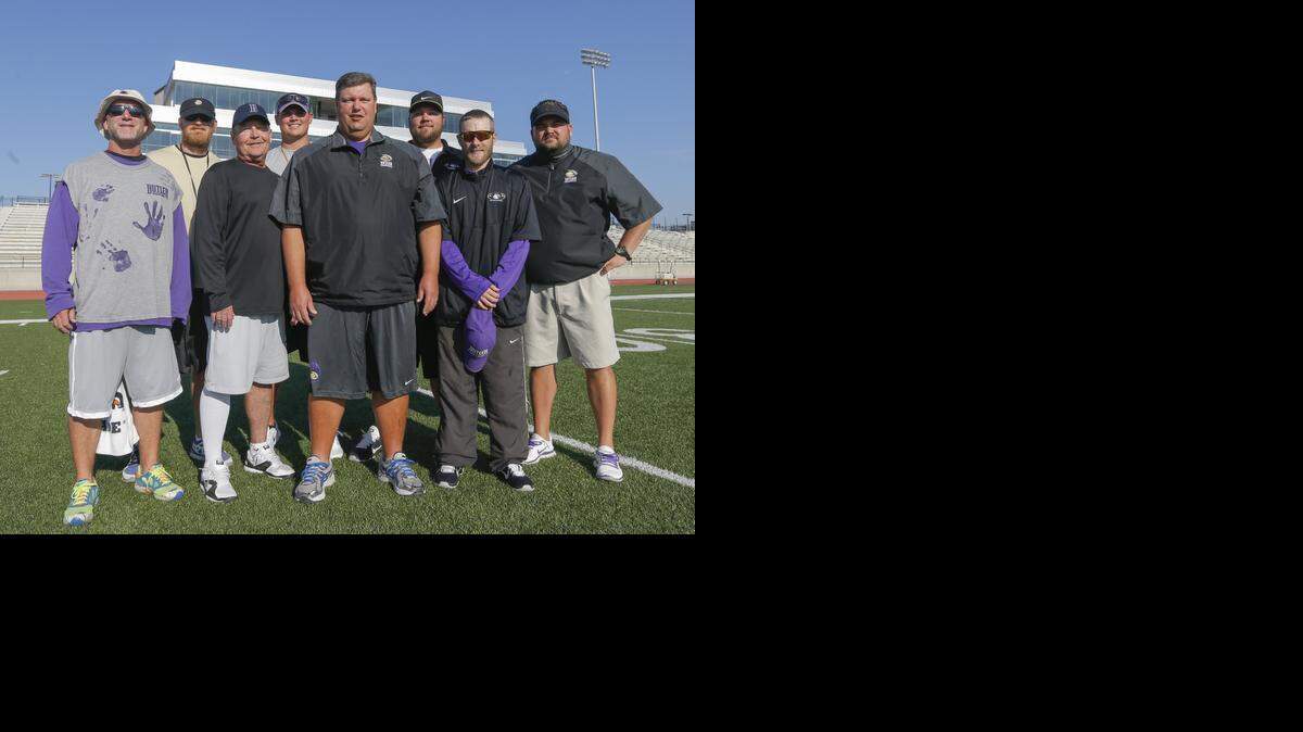 
Butler Community College football coach Troy Morrell, middle, and his staff at BG Products Stadium in El Dorado.
